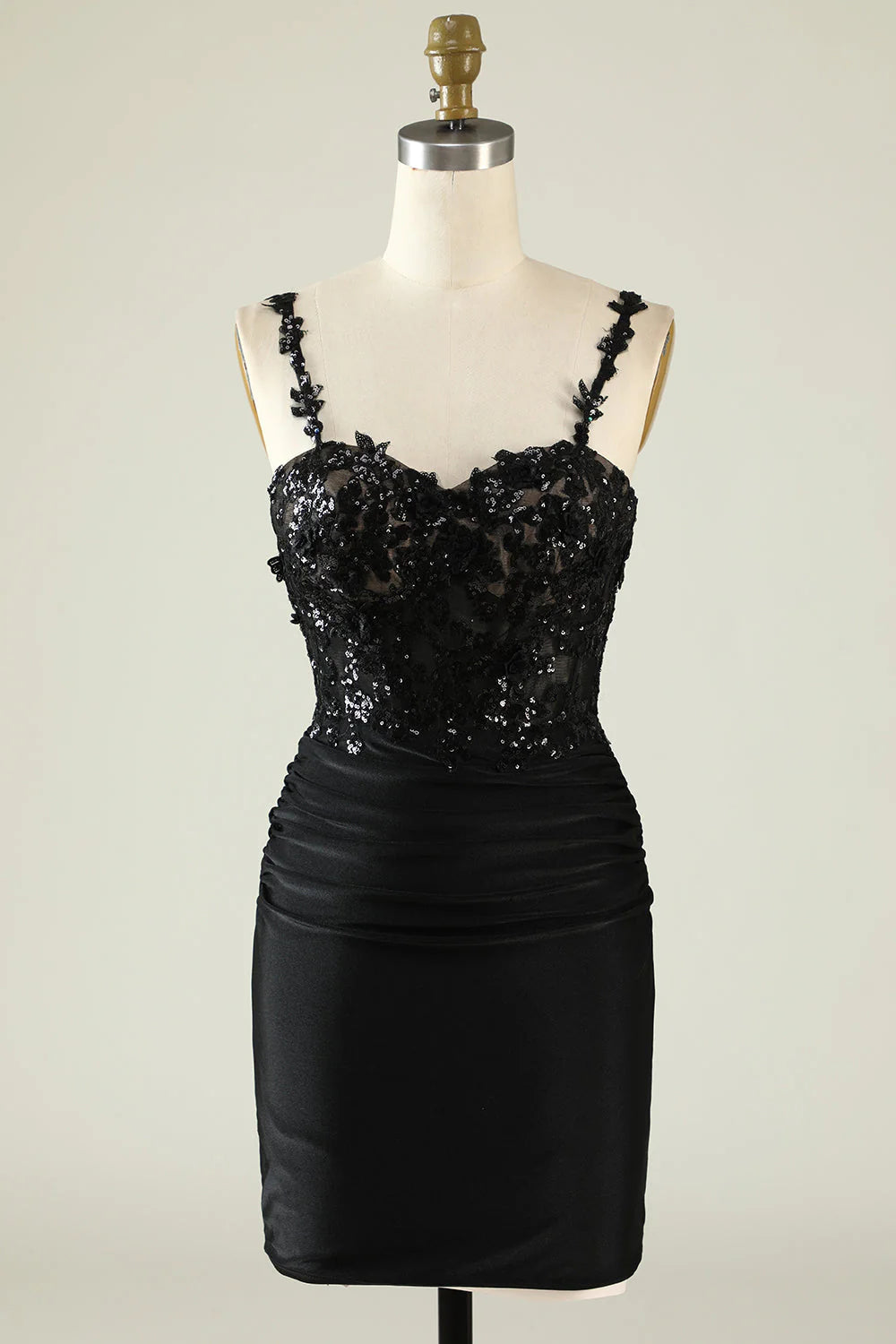 Model wearing the sequins sheath off-the-shoulder short homecoming dress.
