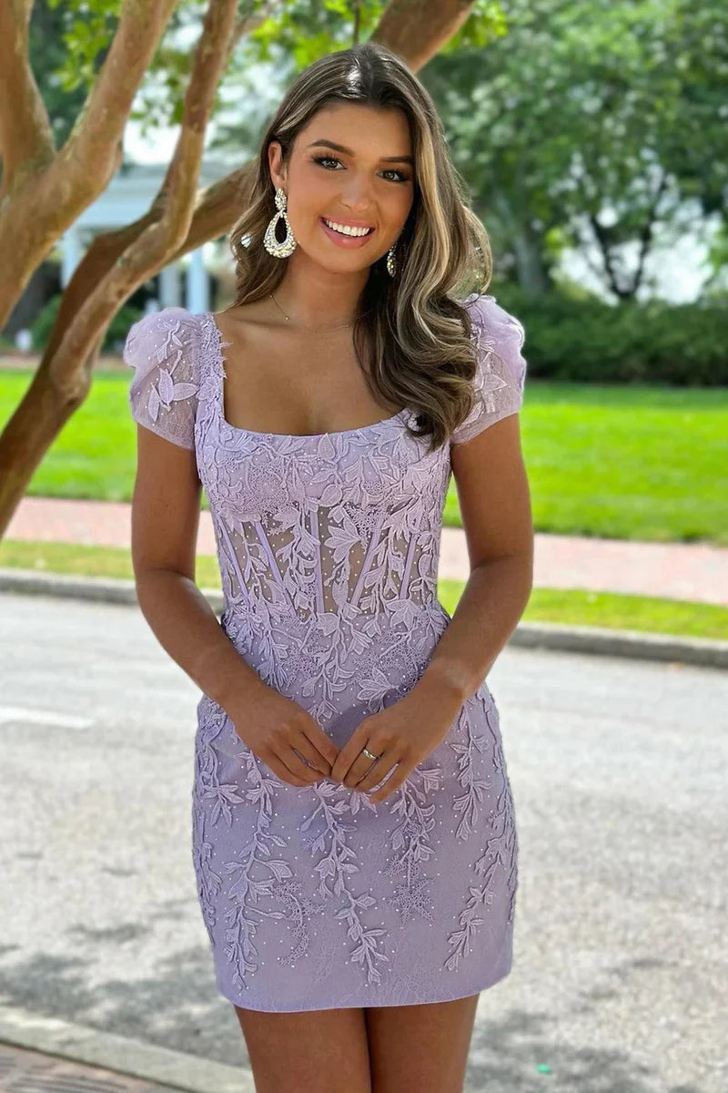 Model wearing a lavender square neck short sleeve lace applique homecoming dress, front view.
