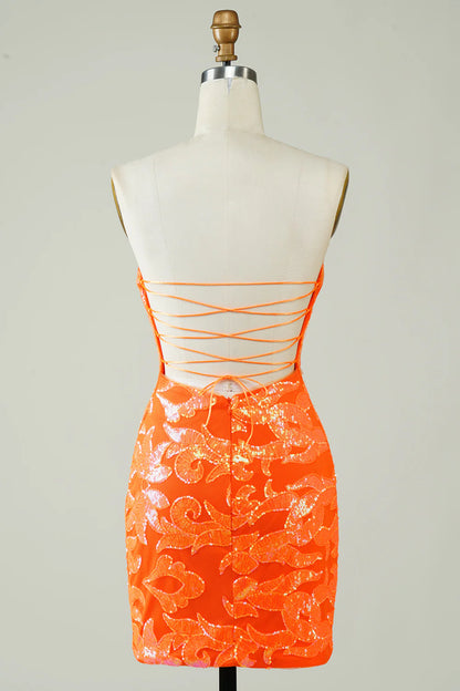 Back view of an orange strapless bodycon dress showing the lace-up detail.