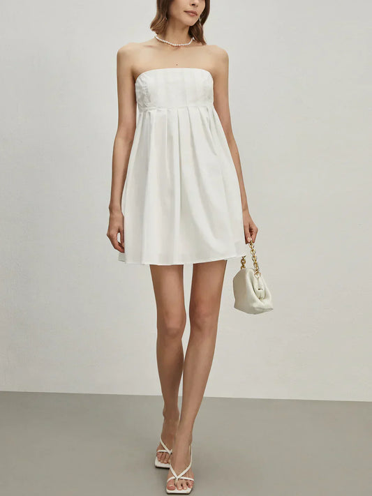 White strapless A-line mini homecoming dress with pleated bodice.