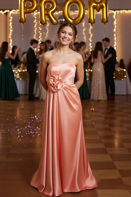 Elegant strapless satin A-line gown with a prominent 3D rose detail at the waist.