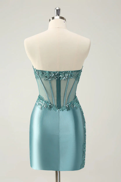 Back view of the elegant strapless corset gown with appliques.