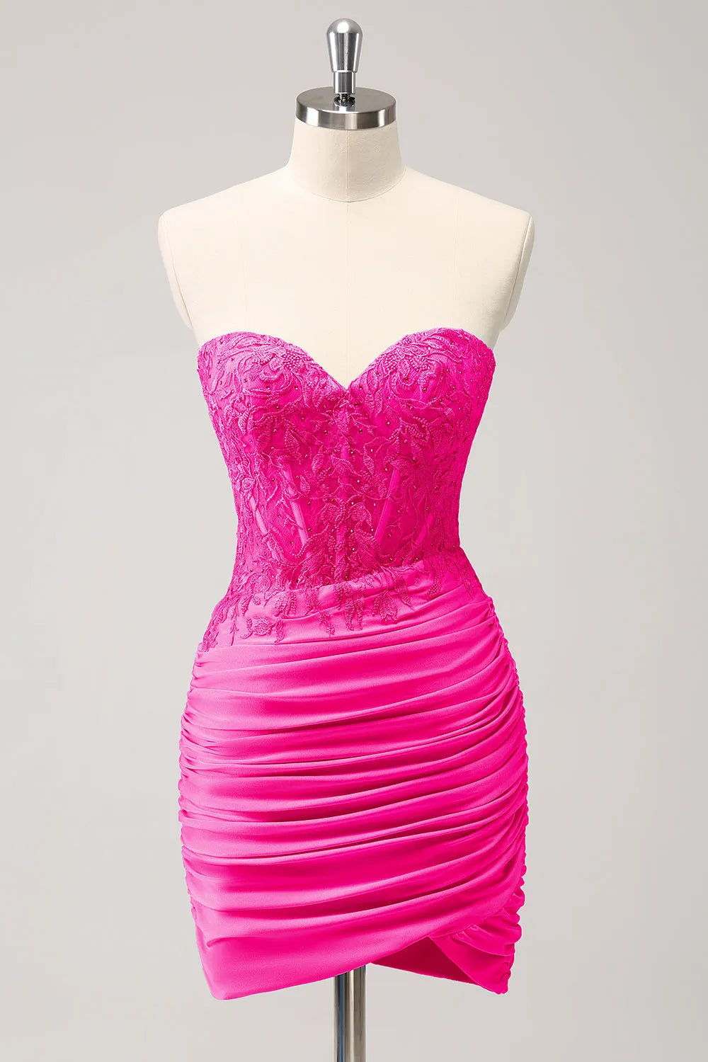 Fuchsia sweetheart bodycon mini dress with corset and beading.