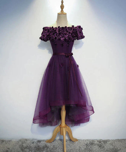 Front view of an elegant dark purple high-low homecoming dress with a sweetheart neckline.