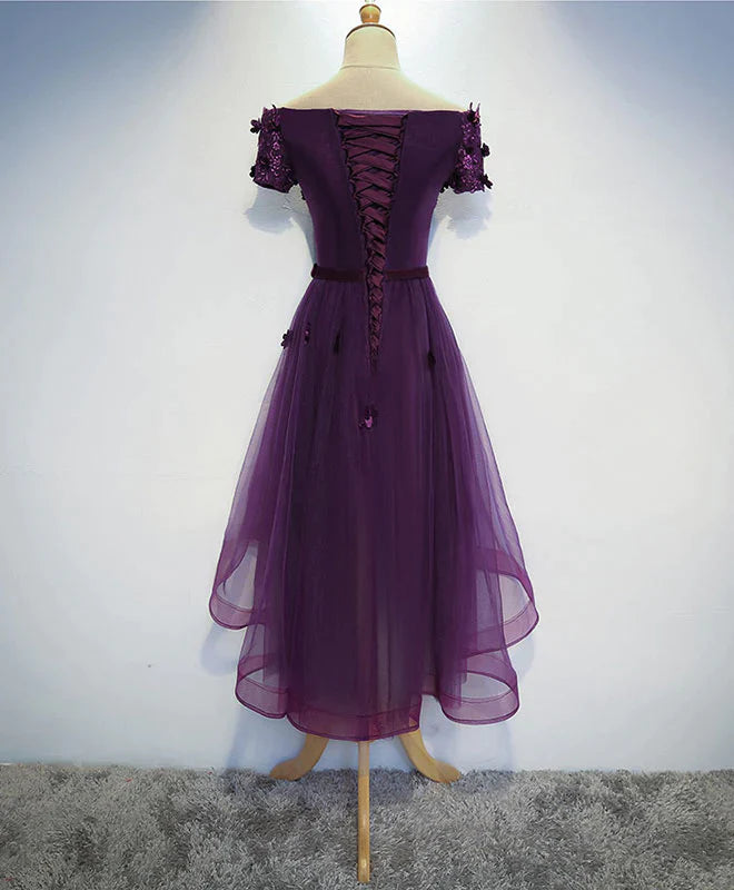 Side view of the chic dark purple high-low party dress, highlighting its silhouette.