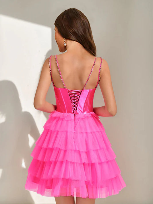 Side view of the short V-neck homecoming dress with tiered ruffles.