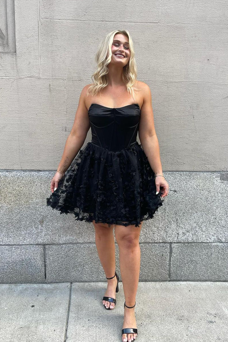 Model showcasing the black lace V-neck short dress from another angle.
