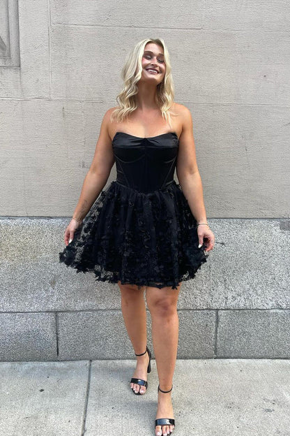 Model showcasing the black lace V-neck short dress from another angle.