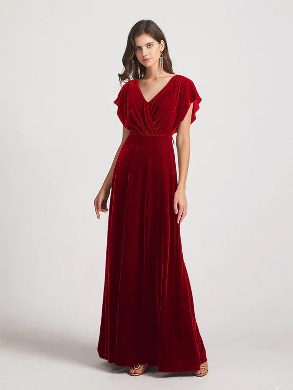 Red velvet flutter sleeve open back bridesmaid dress.