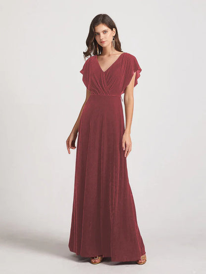 Terracotta velvet flutter sleeve open back bridesmaid dress.