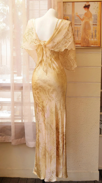 Elegant Gold Floral Chiffon Prom Dress With Capelet Sleeves Beaded Bodice And Mermaid Skirt For Formal Evening Party