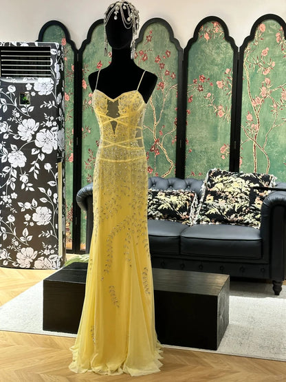 Elegant Yellow Spaghetti Strap Prom Dress With Sweetheart Neckline Sheer Corset Bodice And Beaded Mermaid Tulle Skirt For Formal Evening Party