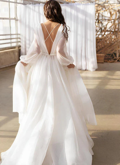Elegant A-Line Boat Neck Long Sleeve Backless Ivory Floor Length Wedding Gown
