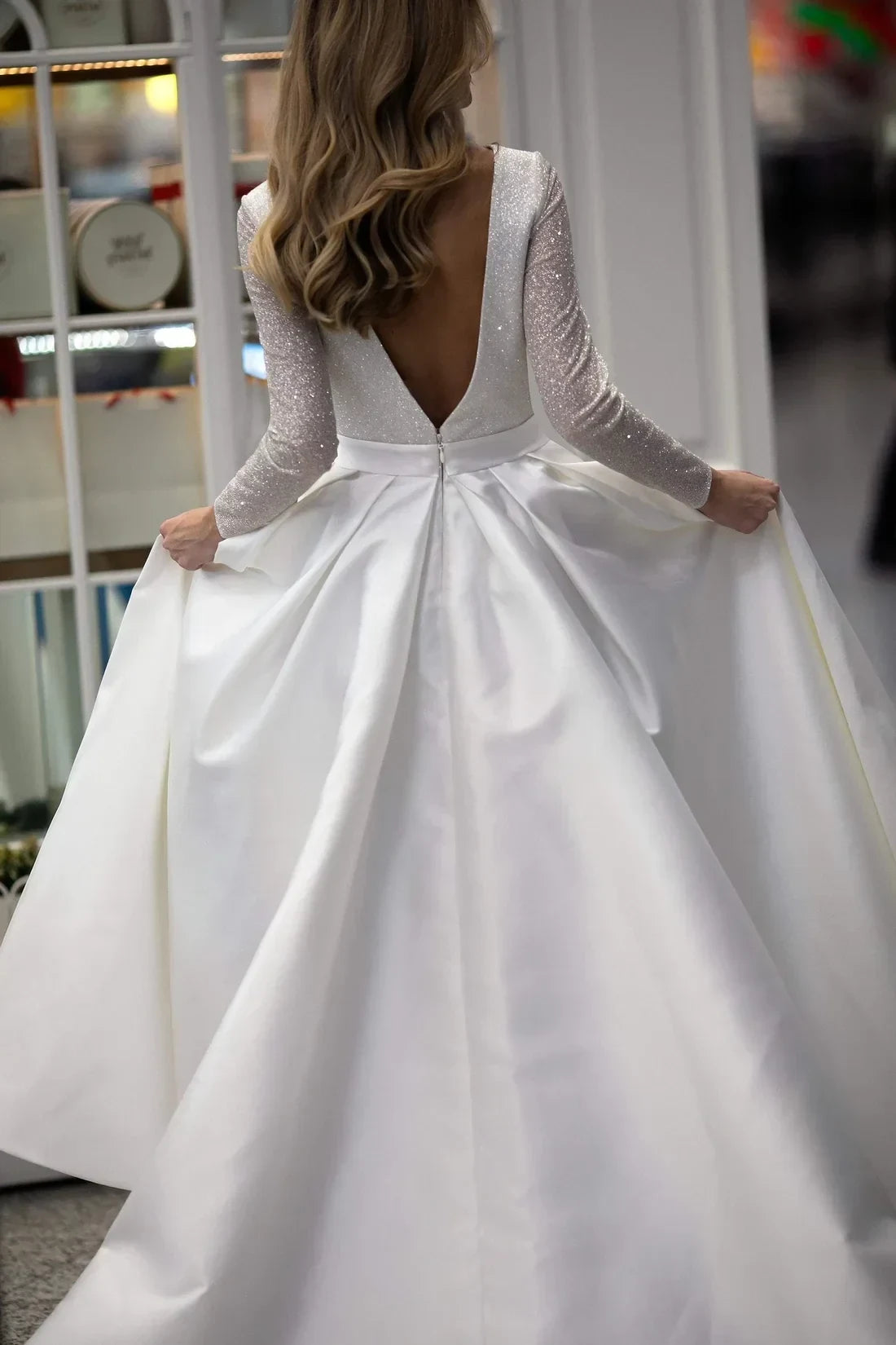 Elegant A-Line Deep V-Neck Long Sleeve Sparkling White Floor-Length Wedding Gown