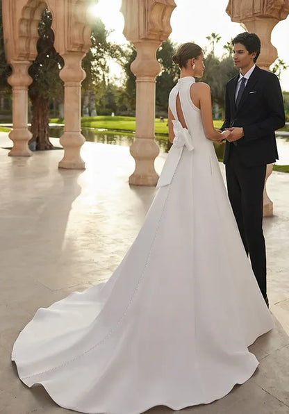 Elegant A-Line High-Neck Sleeveless Bow-Back White Floor-Length Wedding Gown