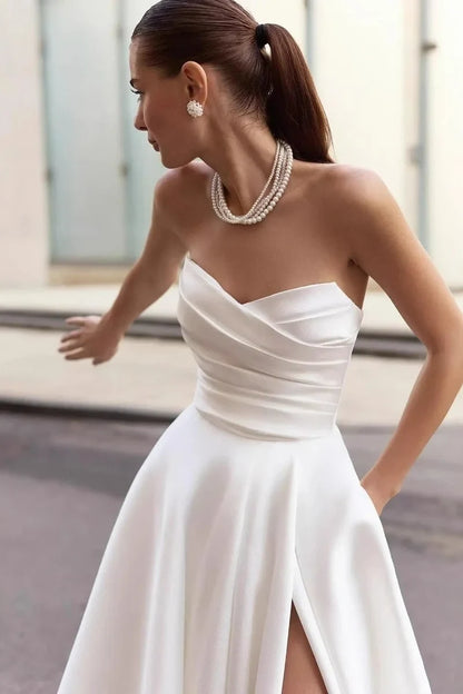 Elegant A-Line Sweetheart Strapless Draped High Slit White Floor-Length Wedding Gown