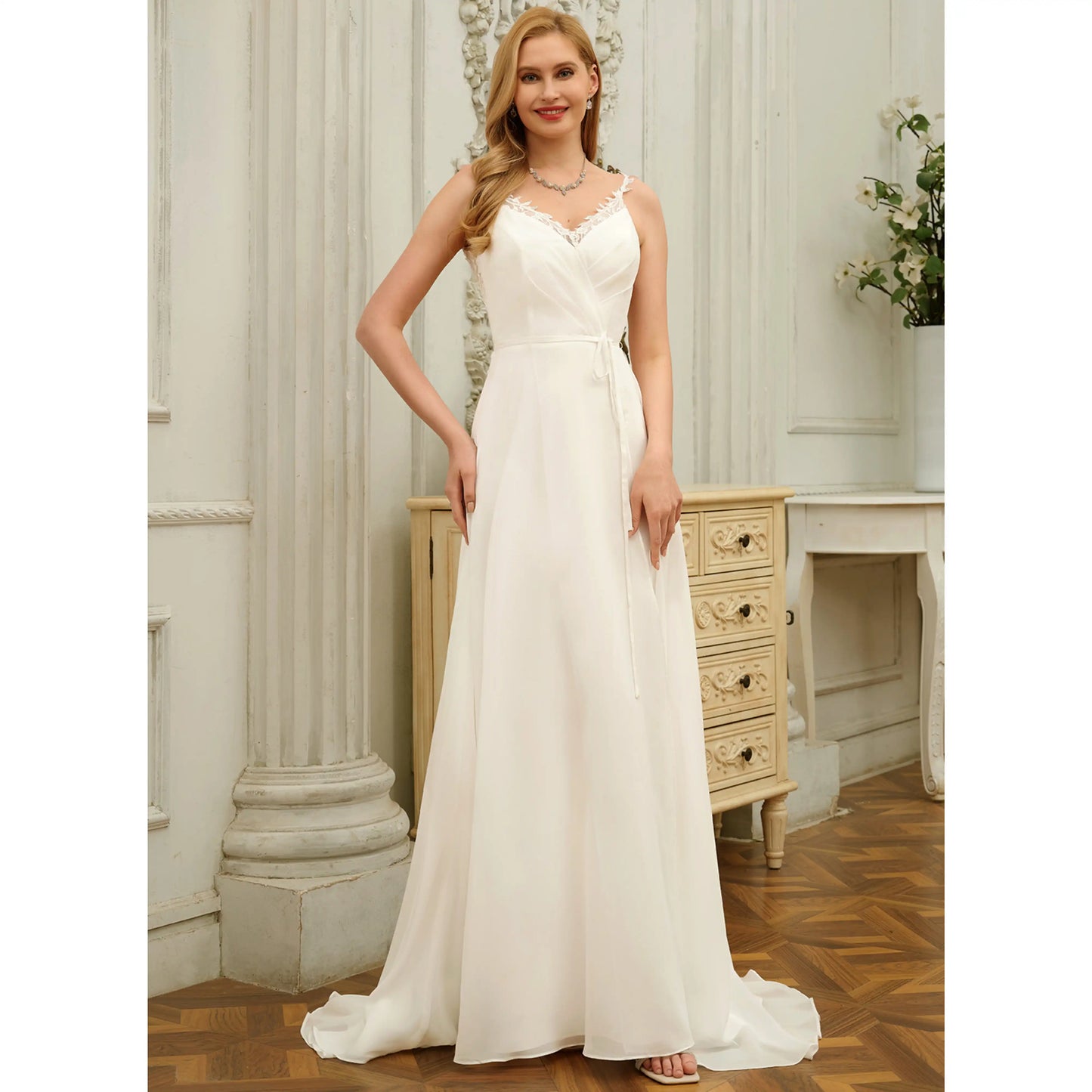 Elegant A-Line V-Neck Sleeveless Flowy Lace Ivory Floor-Length Wedding Gown