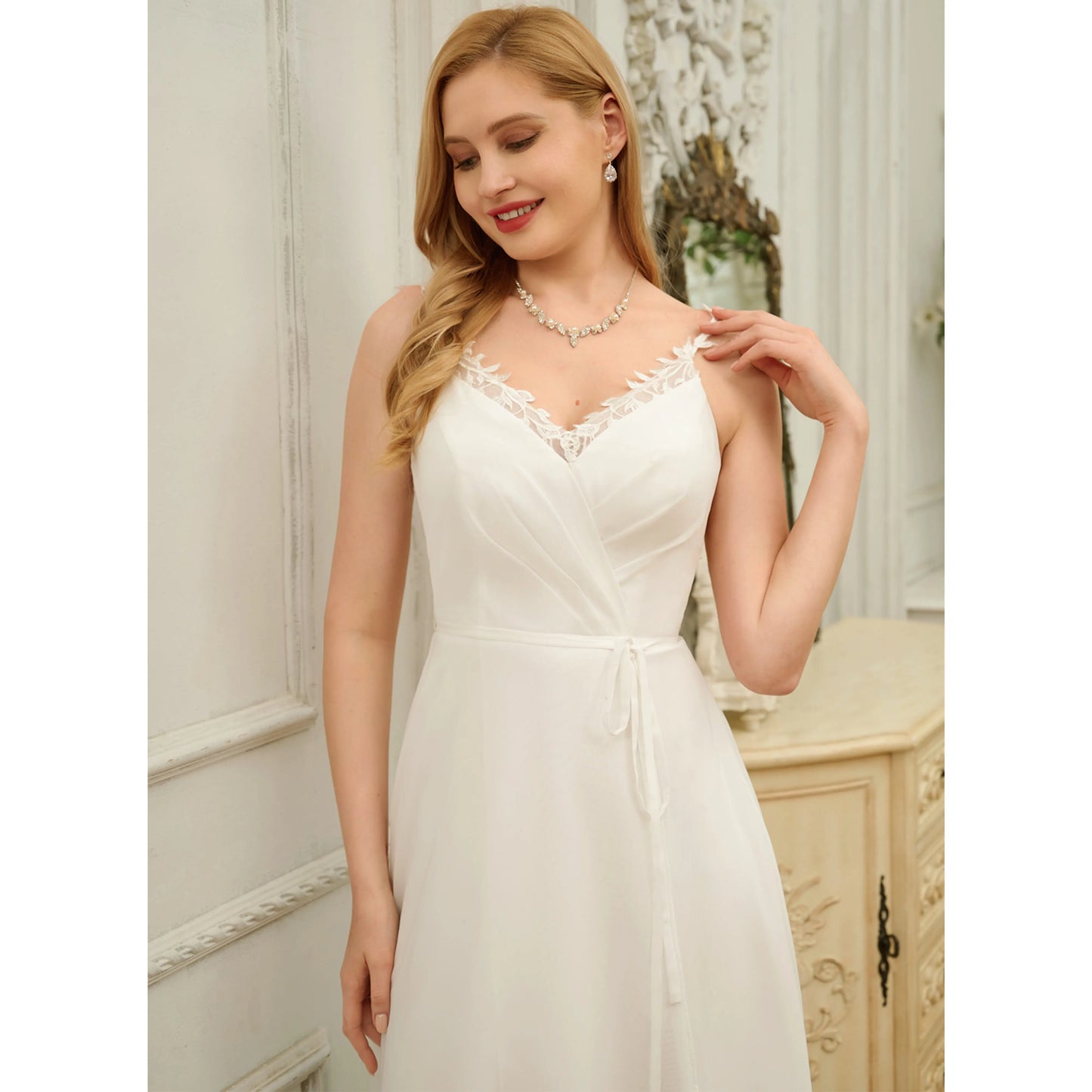 Elegant A-Line V-Neck Sleeveless Flowy Lace Ivory Floor-Length Wedding Gown
