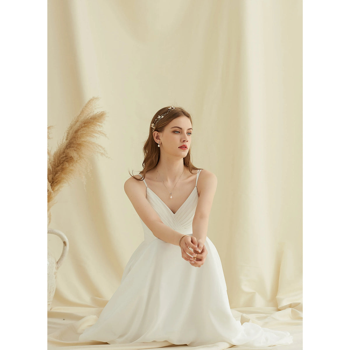 Elegant A-Line V-Neck Sleeveless Pleated Backless White Floor-Length Wedding Gown