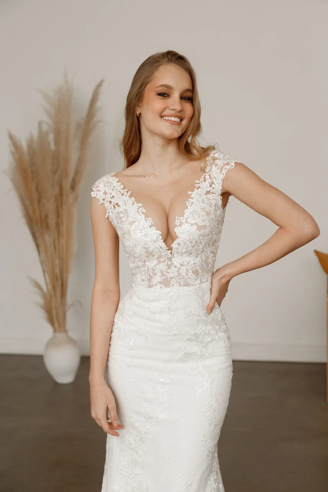 Elegant Mermaid Deep V-Neck Cap Sleeve Lace Sheer White Floor Wedding Dress
