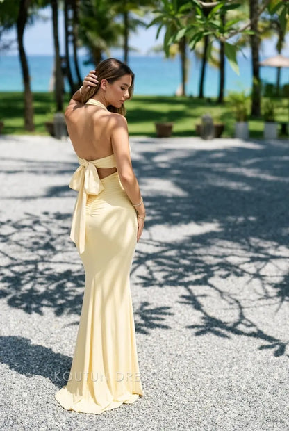 Elegant Mermaid Strapless Sleeveless Ruched Backless Pastel Yellow Floor-Length Prom Gown