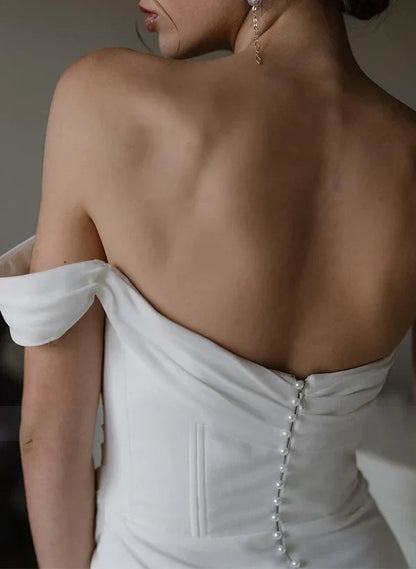 Elegant Sheath Off-Shoulder Sleeveless Draped Pearl-Buttoned White Floor-Length Wedding Gown