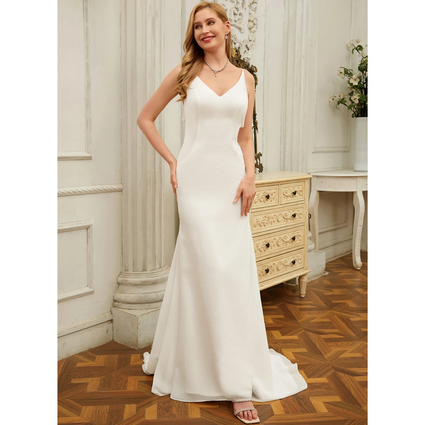 Elegant Sheath V-Neck Sleeveless Flowy Backless White Floor-Length Wedding Gown