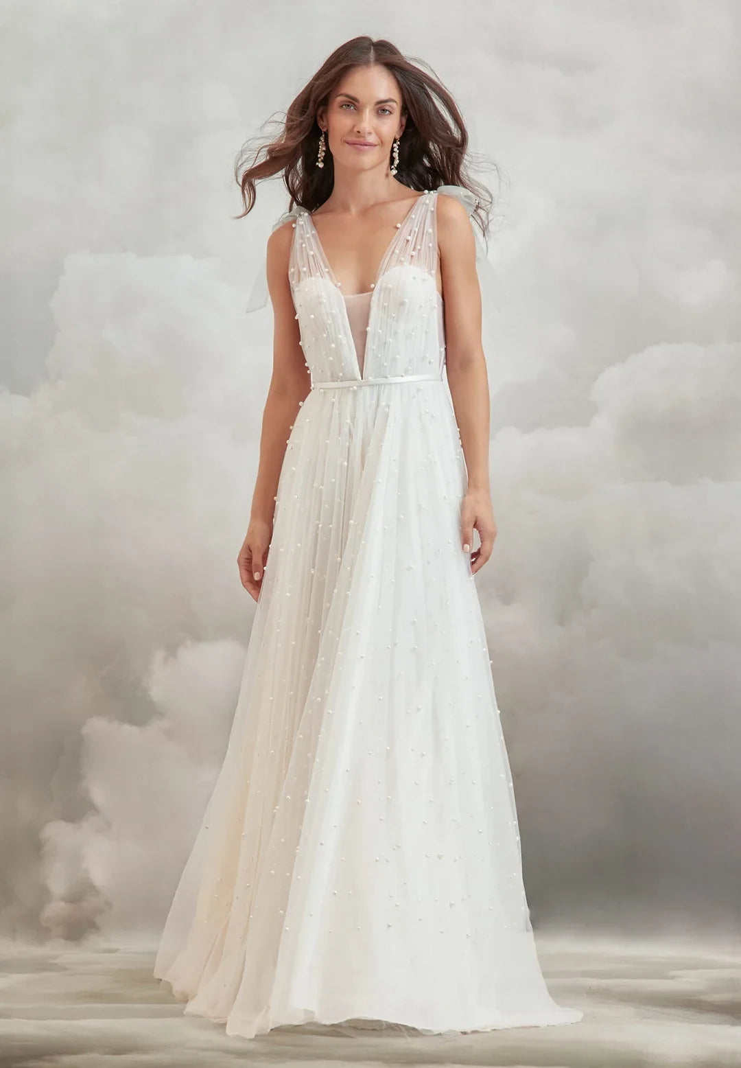 Ethereal A-Line V-Neck Sleeveless Pearl Embellished White Floor-Length Wedding Dresses