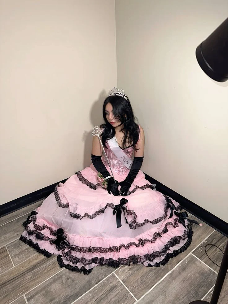 Evening Dress Sleeveless Pink Tulle Ball Gown with Corset Bodice Tiered Ruffle Skirt  Black Lace Trim and Bow Accents