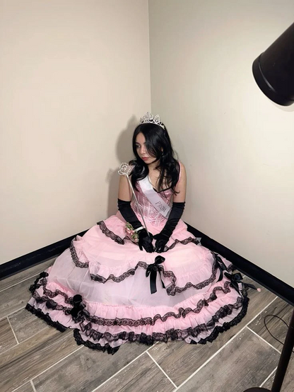 Evening Dress Sleeveless Pink Tulle Ball Gown with Corset Bodice Tiered Ruffle Skirt  Black Lace Trim and Bow Accents