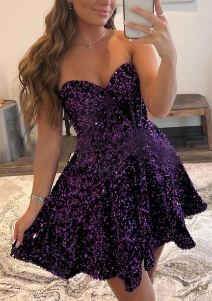Front view of a model wearing the purple strapless sweetheart sequin velvet A-line short homecoming dress.