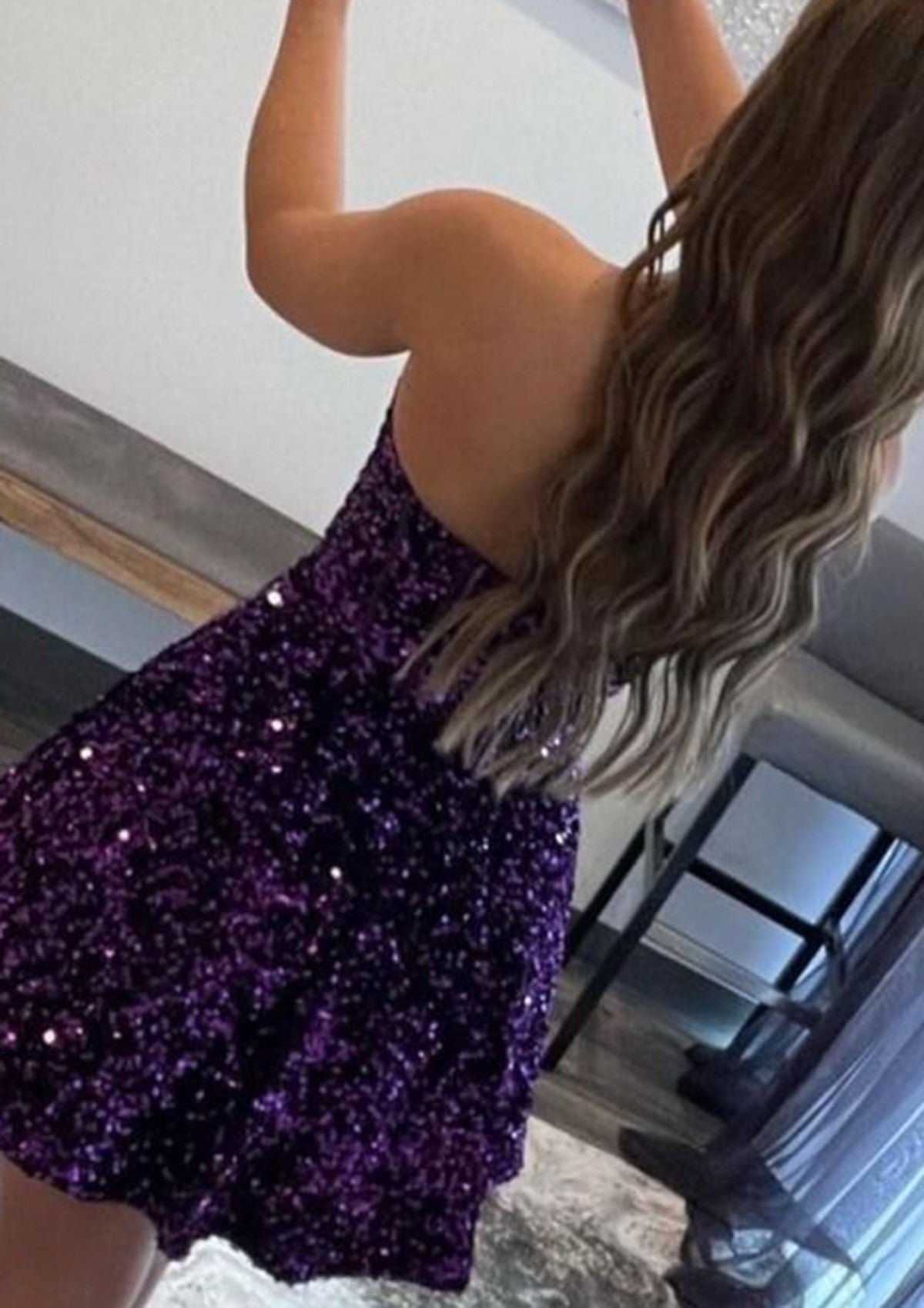 Model showcasing the purple strapless sequin velvet A-line short formal dress.