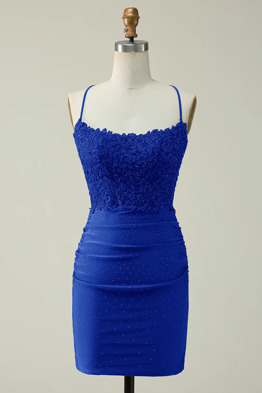 Royal blue halter bodycon dress with intricate sparkly appliques.