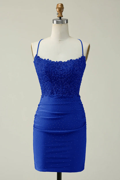 Royal blue halter bodycon dress with intricate sparkly appliques.