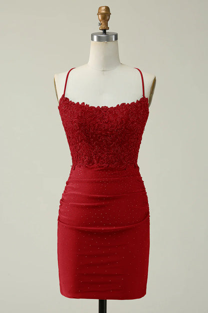 Burgundy halter bodycon dress with sparkly appliques.
