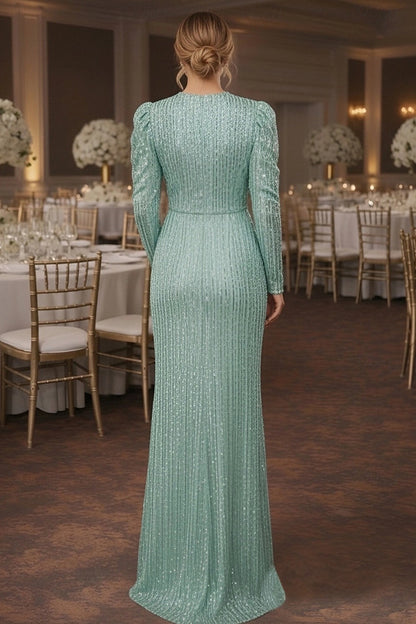 Full view of the shimmering sequin mermaid dress with puffed shoulders.
