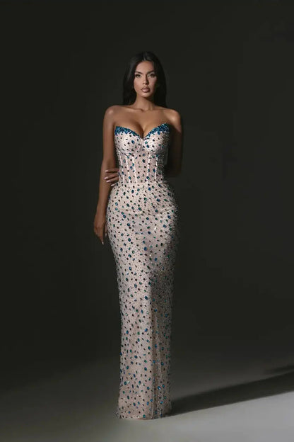 Glamorous Nude Strapless Mermaid Gown with Blue Crystal Embellishments: Prom Dress