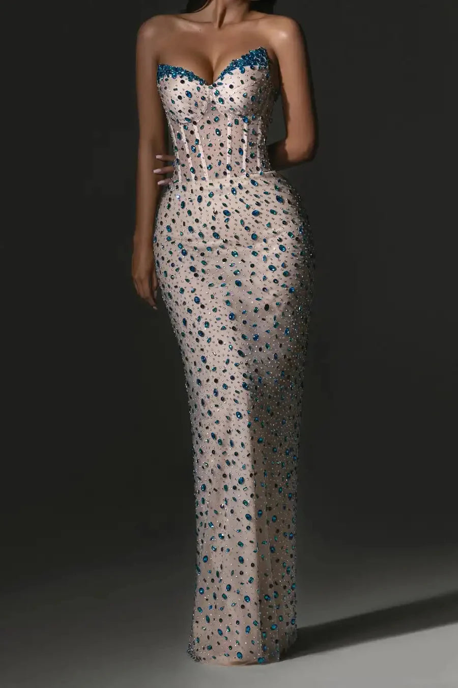 Glamorous Nude Strapless Mermaid Gown with Blue Crystal Embellishments: Prom Dress