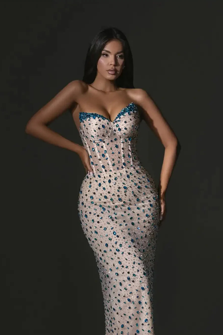 Glamorous Nude Strapless Mermaid Gown with Blue Crystal Embellishments: Prom Dress