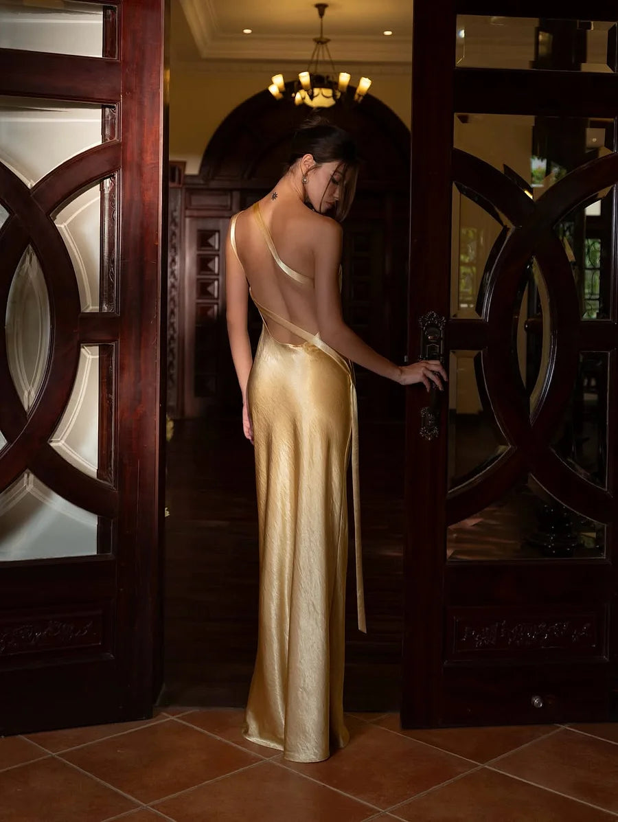 Gold Satin Maxi Prom Dresses with One Shoulder Crisscross Straps Open Back Mermaid Skirt for Prom and Gala