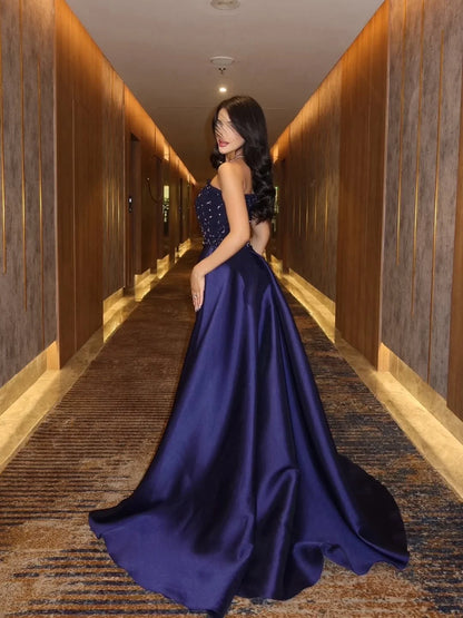 Luxurious Strapless Beaded Bodice Satin A-Line Maxi Prom Dress with Dramatic Trailing Train