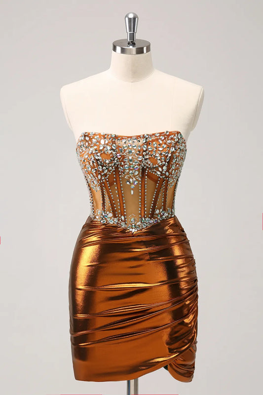 Model wearing a metallic copper strapless ruched bodycon homecoming dress with beading.