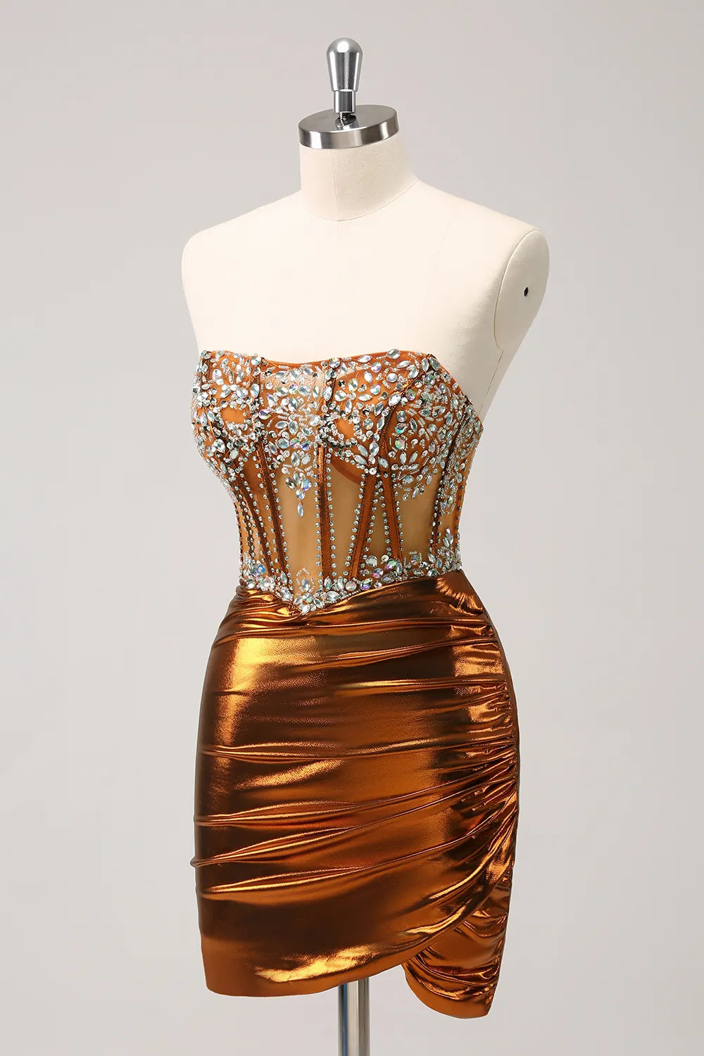 Close-up of the metallic copper fabric, ruching, and delicate beading on the dress.
