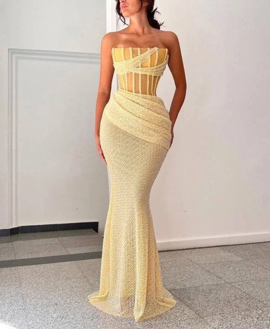 Pale Yellow Strapless Corset Prom Dress with Sheer Boning and Beaded Mermaid Skirt for Formal Events and Prom Nights
