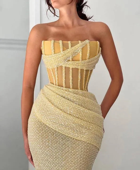 Pale Yellow Strapless Corset Prom Dress with Sheer Boning and Beaded Mermaid Skirt for Formal Events and Prom Nights