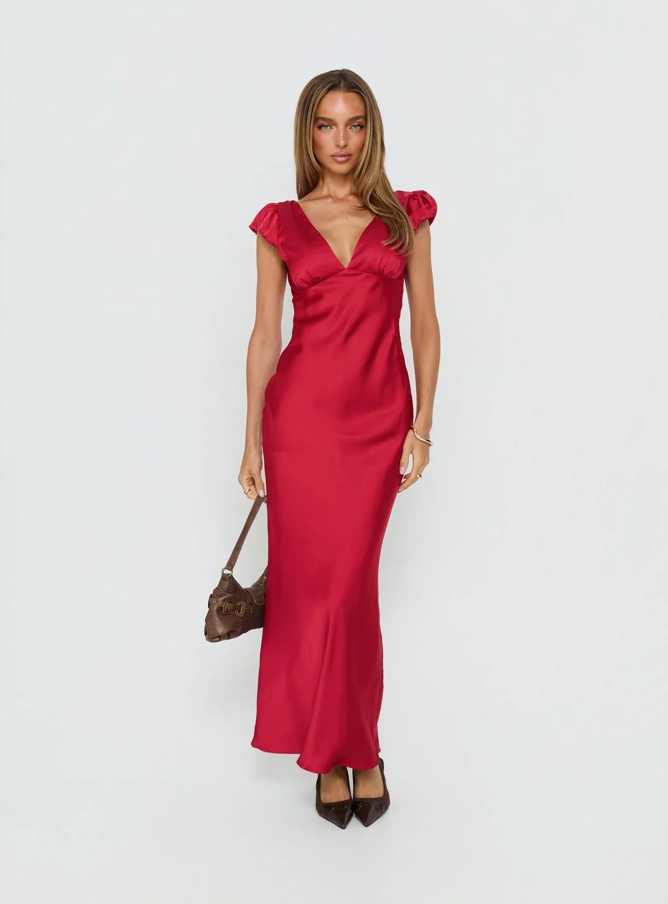 Red Satin Prom Dress with Puffed Cap Sleeves V Neckline and Tie Back Detail for Formal Events and Prom Nights