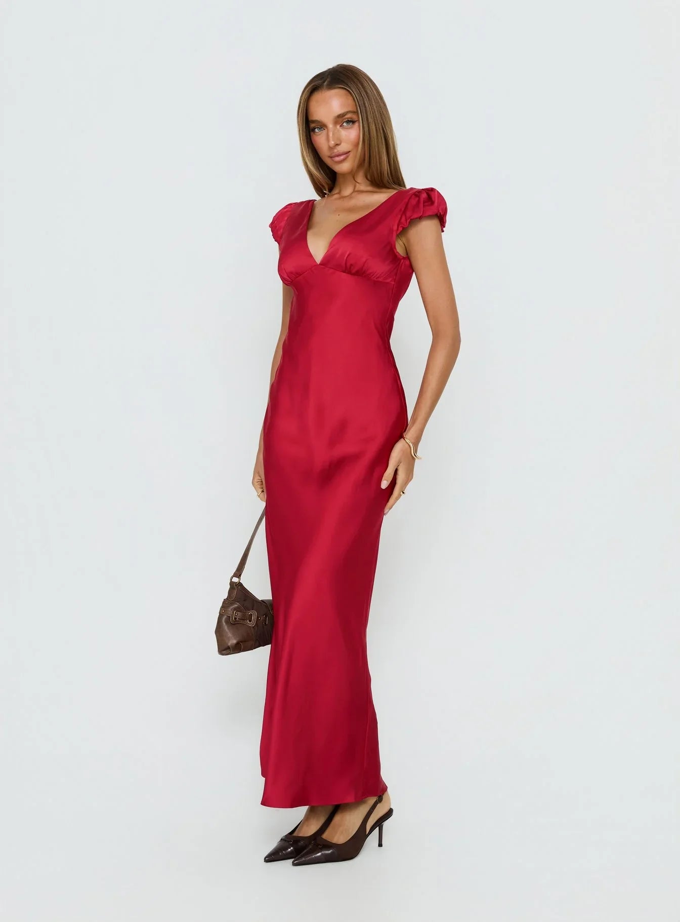 Red Satin Prom Dress with Puffed Cap Sleeves V Neckline and Tie Back Detail for Formal Events and Prom Nights