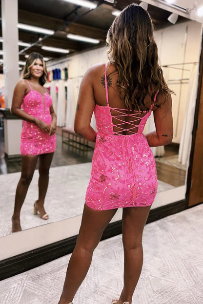 Back view of a short ink homecoming dress featuring a lace-up detail.