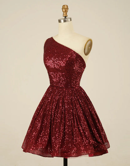 Close-up back view of the blue sequin mini dress, highlighting the backless detail.