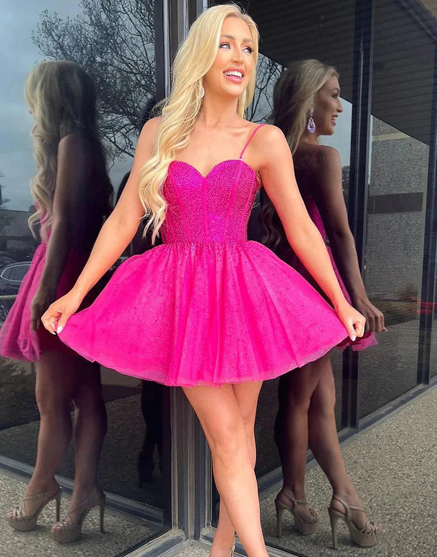 Hot pink A-line homecoming dress with glitter and beading.